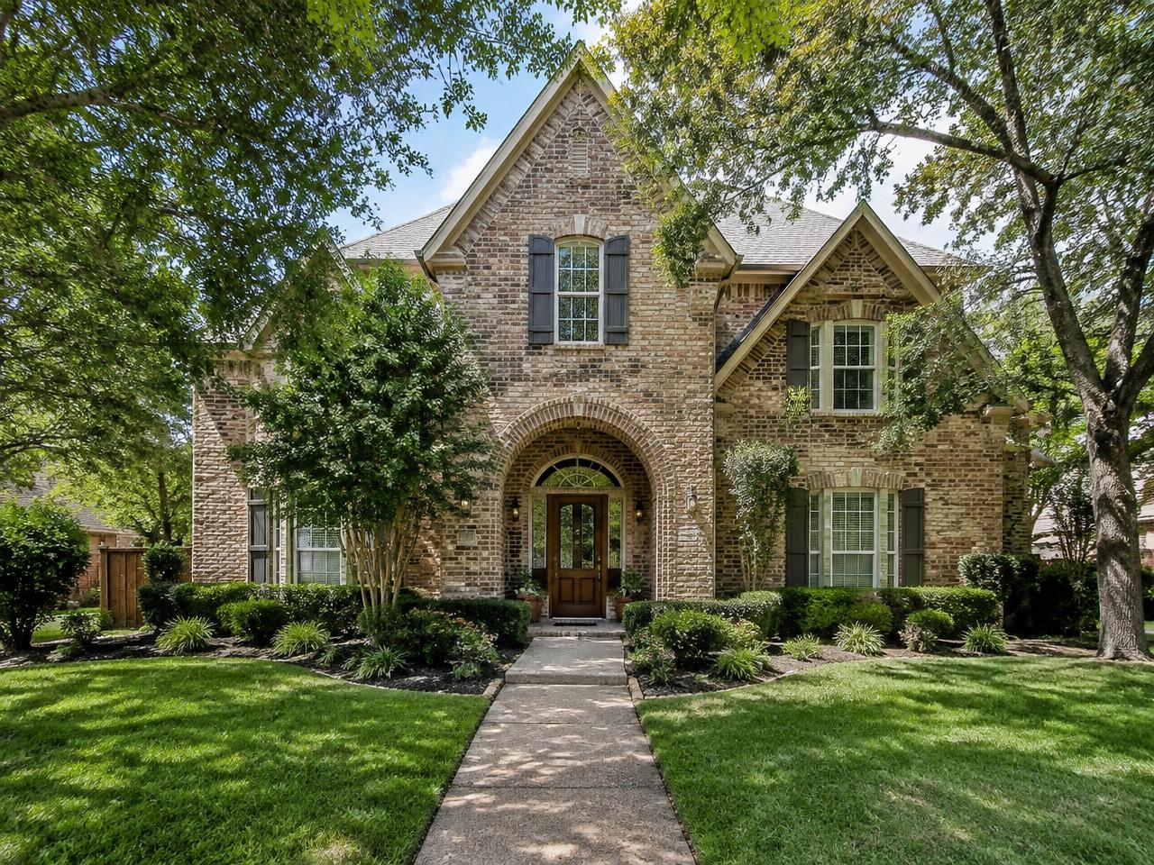 Stately Traditional with Arched Entry